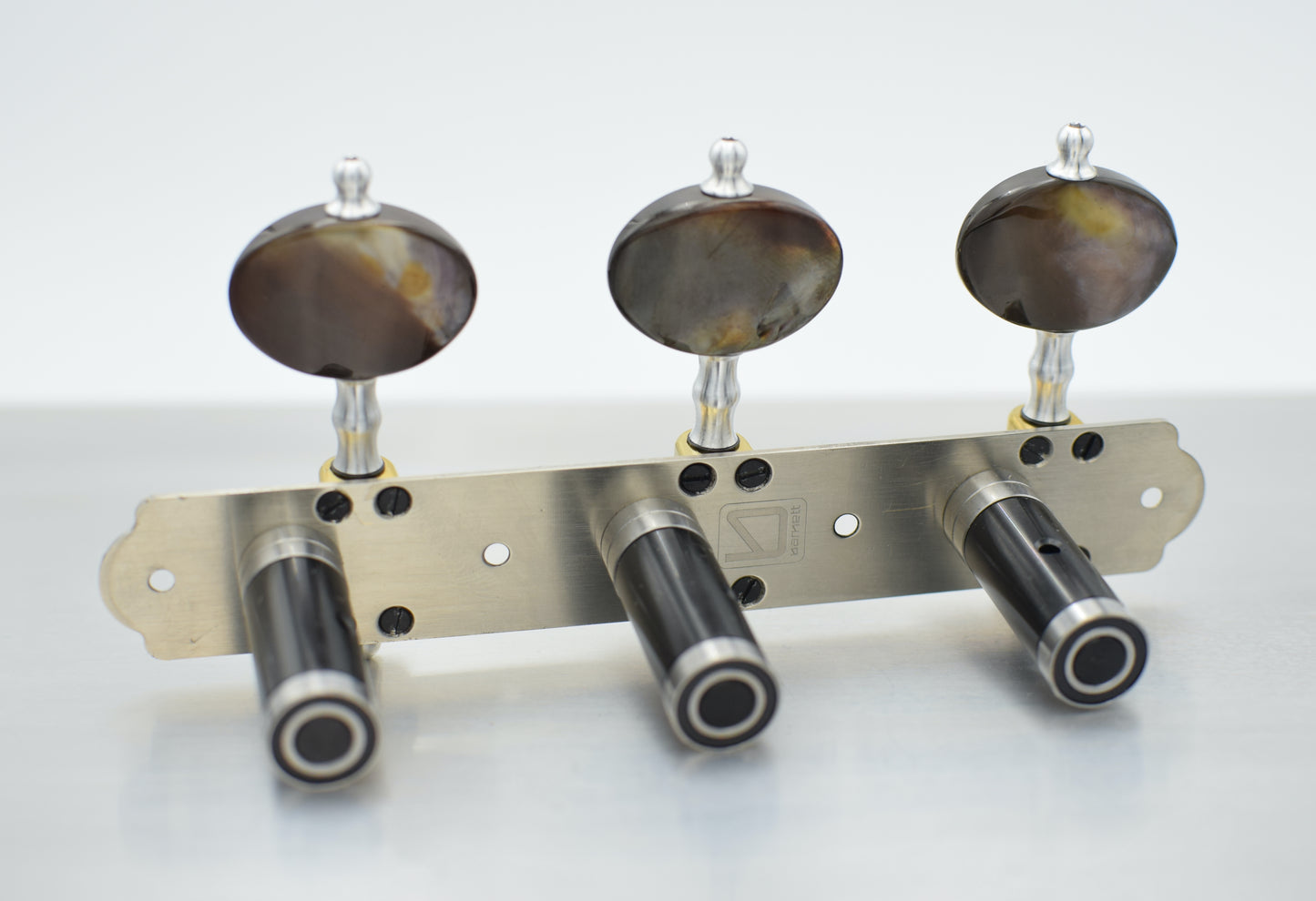B-Ware: Trinity Brass, Nickel Plated, Black MOP buttons, Black Rollers